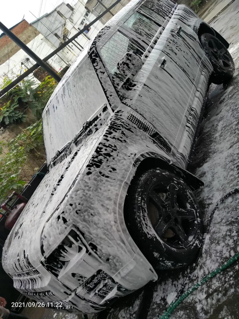 Black SUV Active Foam Wash & High-Pressure Hose Rinse at A1 Car Wash