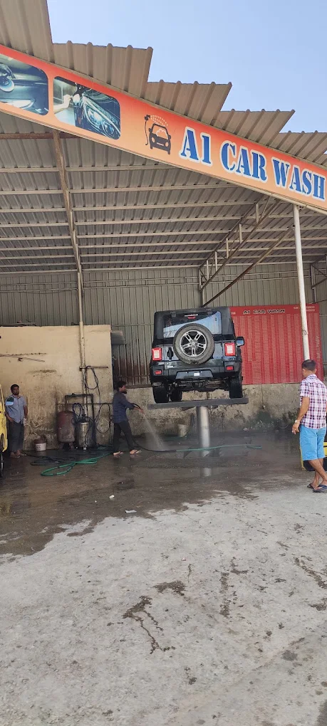 White Toyota Fortuner in Detailing Studio under LED Lights at A1 Car Wash