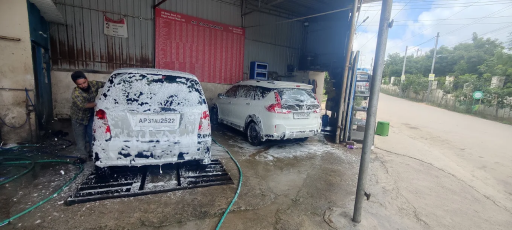 Yellow Hatchback Hydraulic Ramp Wash Bay at A1 Car Wash